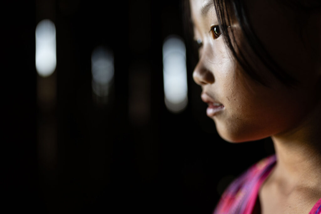 Young Hmong in her house