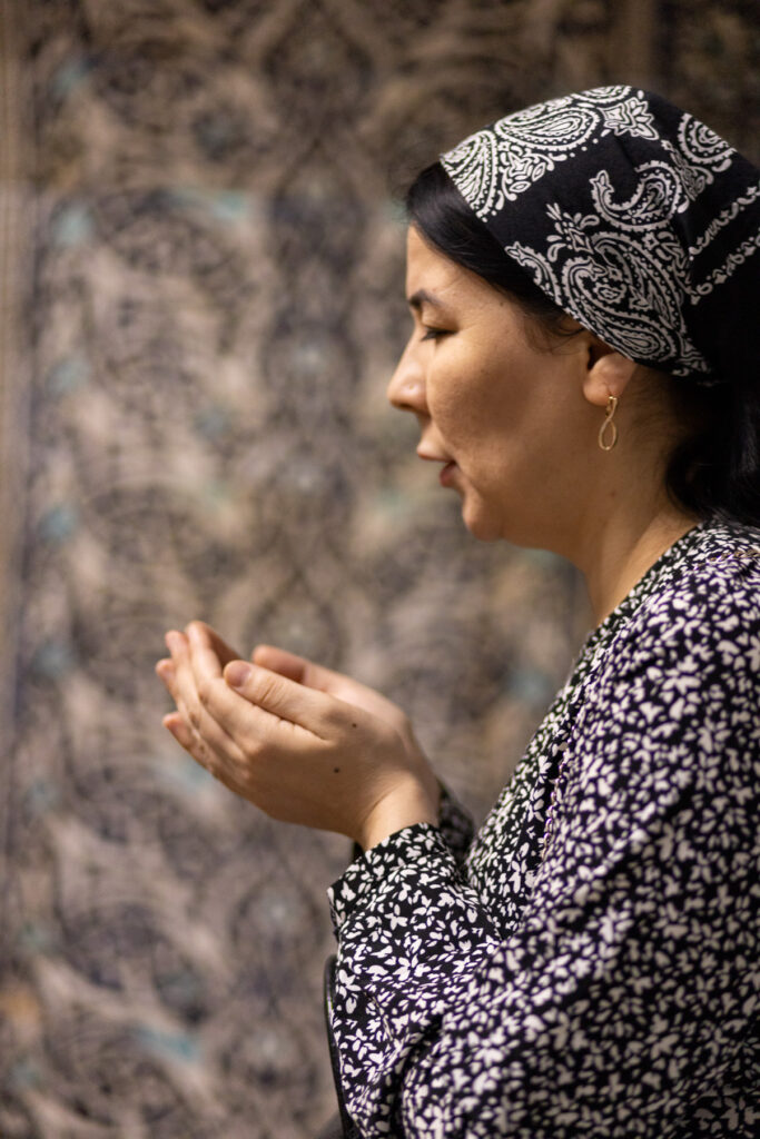 Uzbek woman praying