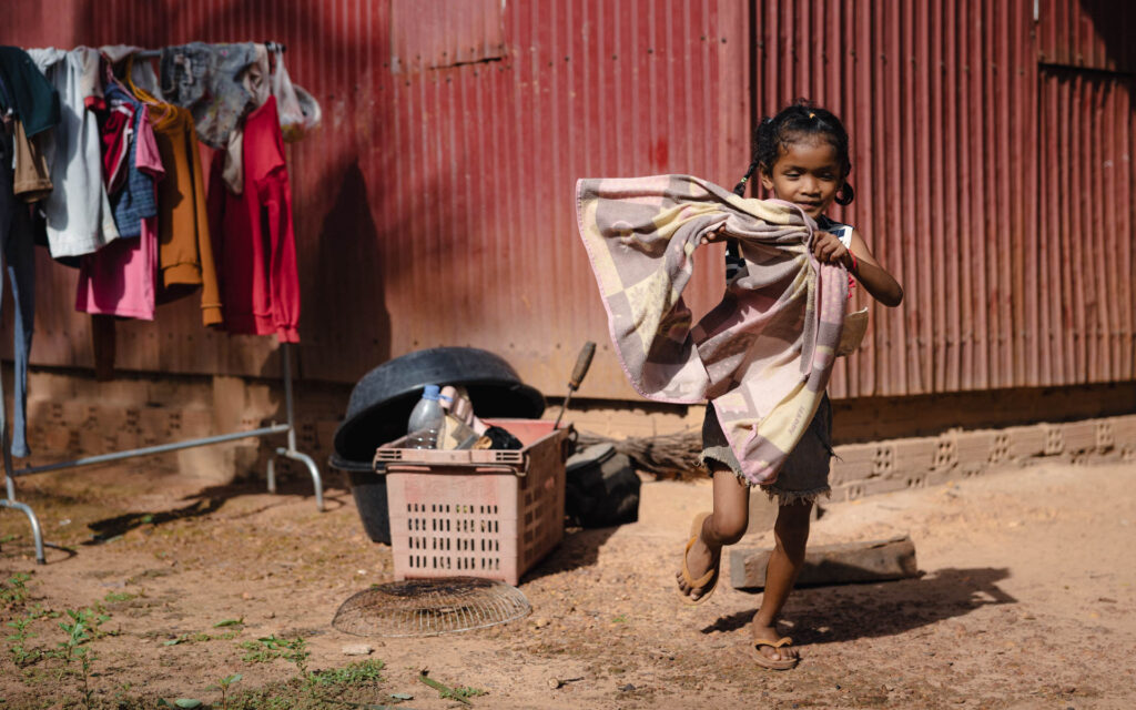 Playful little girl by Manuela