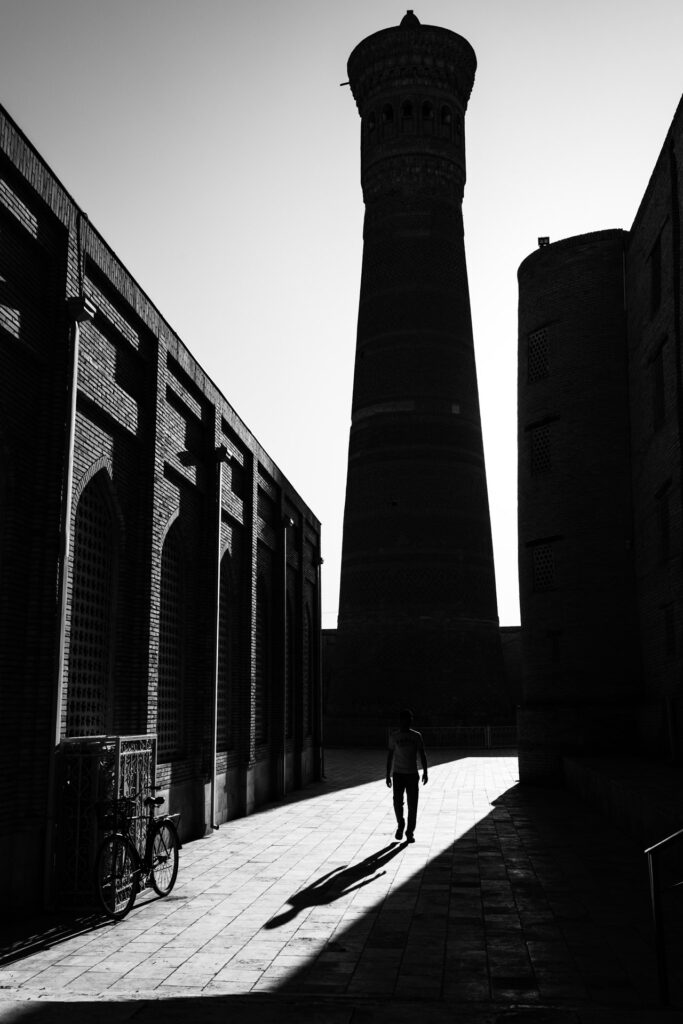 Sunlight creating long shadows in a street in Uzbekistan