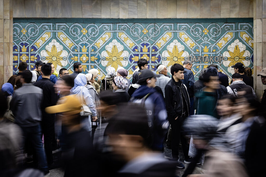 Slow shutter capturing movement in the Uzbek underground