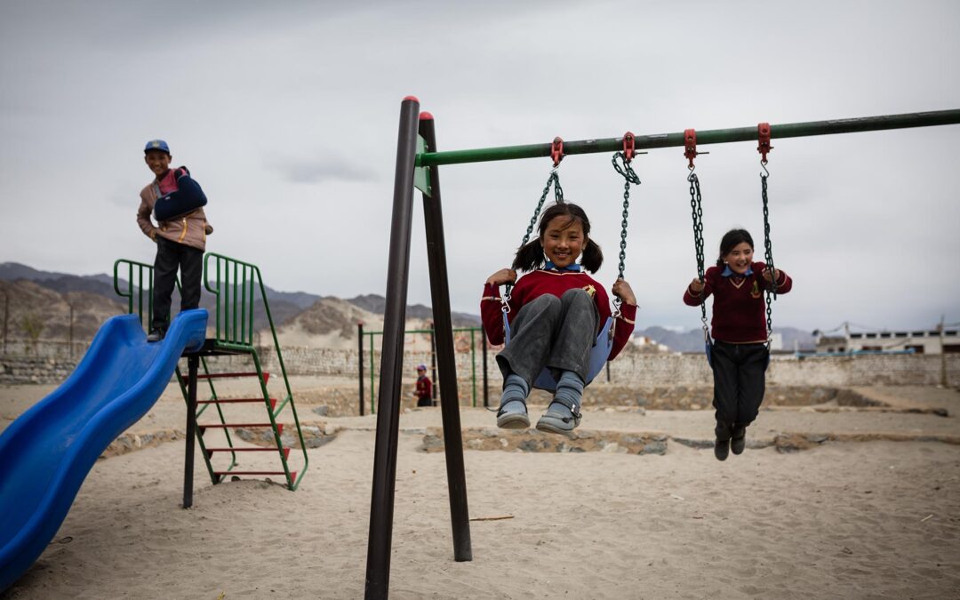 35mm lens capturing kids playing at a Ladakhi school for LEHO NGO, revealing the scene’s rich layers.